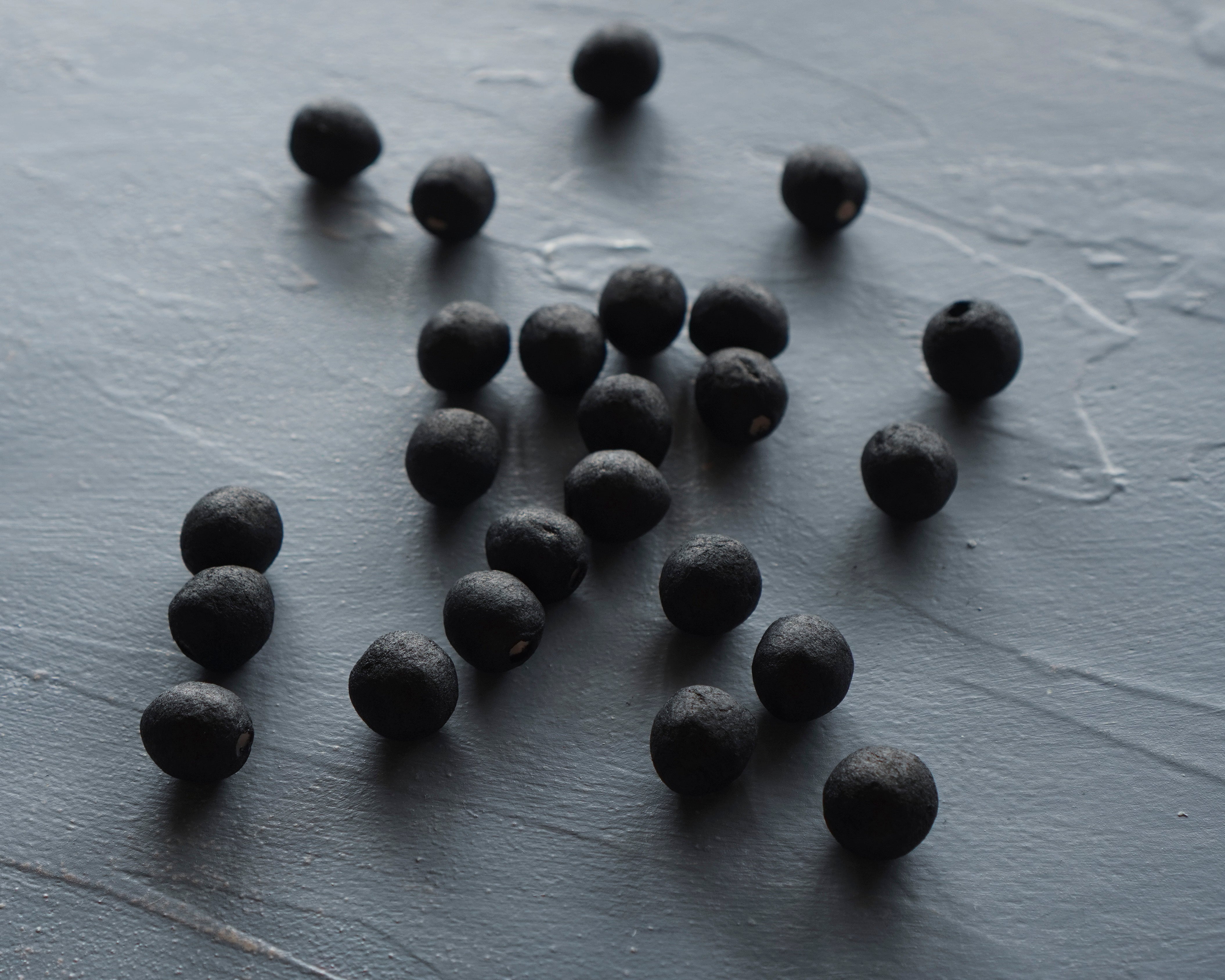 Elf Feet - Black Tinted Spun Cotton Eggs 12x10mm, 24 Pcs.